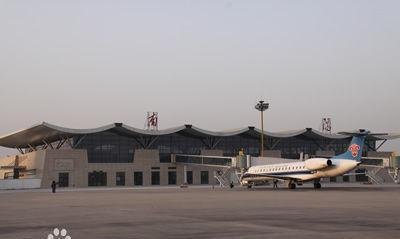 A sleek Shanghai airport shuttle bus gliding through the bustling city streets, symbolizing efficient and modern travel upgrades